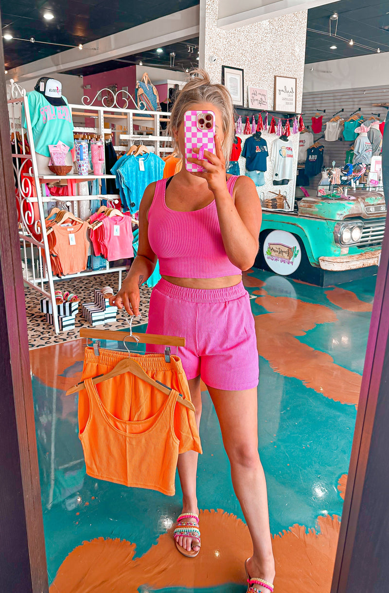 Pink 2 piece set, stretchy shorts and crop top. Ribbed Jersey like material 
